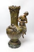 A French Art Nouveau patinated spelter figural vase, on marble stand, stamped Aug. Moreau with