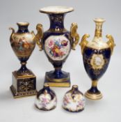 A two-handled pedestal Coalport vase, together with two other vases and a pair of posy vases.