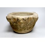 A 17th/18th century carved marble mortar, 31cm