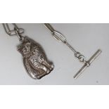 A modern silver rattle, modelled as a cat, 50mm, suspended from a 1920's silver albert.