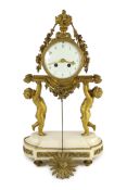 A French Louis XVI style ormolu and white marble mantel clock, the drum case supported by figures of