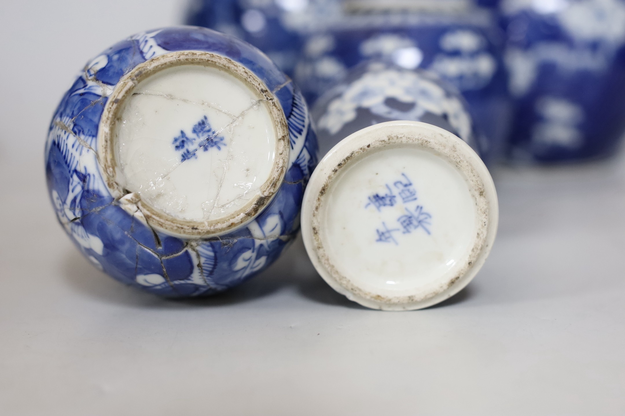 Four Chinese blue and white prunus pattern ginger jars, together with three similar vases. 19th/ - Image 7 of 10