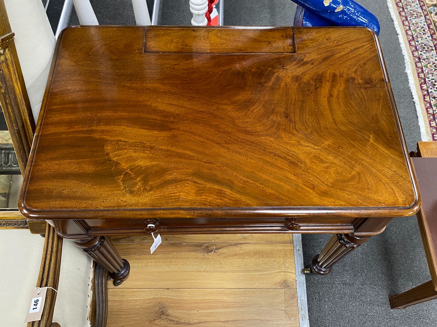 An early Victorian mahogany writing table stamped M Willson, 68 Great Queen Street, width 76cm, - Image 2 of 2