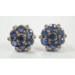 A pair of white metal, sapphire and diamond cluster set flower head ear studs, 10mm, gross weight