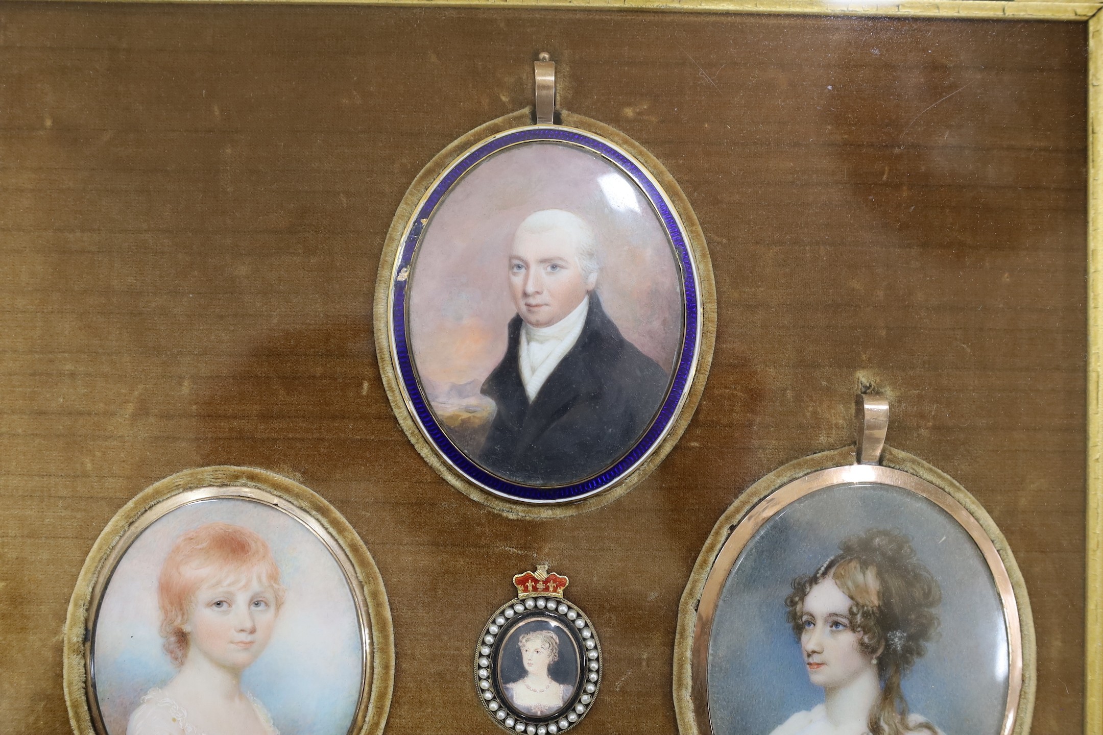 A group of five 19th century portrait miniatures on ivory, framed as one, in a decorative gilt and - Image 3 of 3