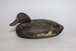 A 19th century painted decoy duck. 33cm long