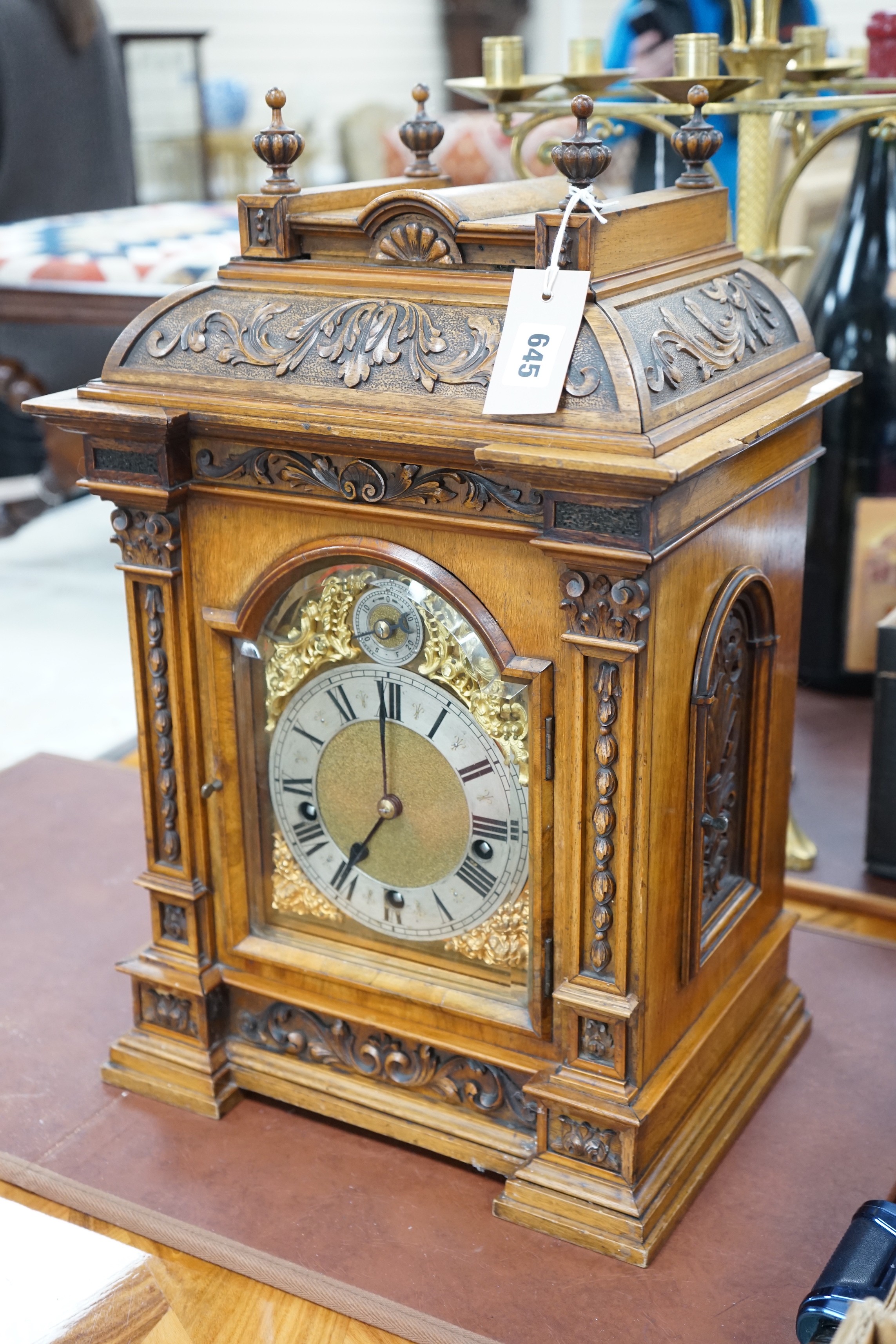 A 19th century architectural walnut bracket clock, with key and pendulum. 53cm tall - Image 2 of 5