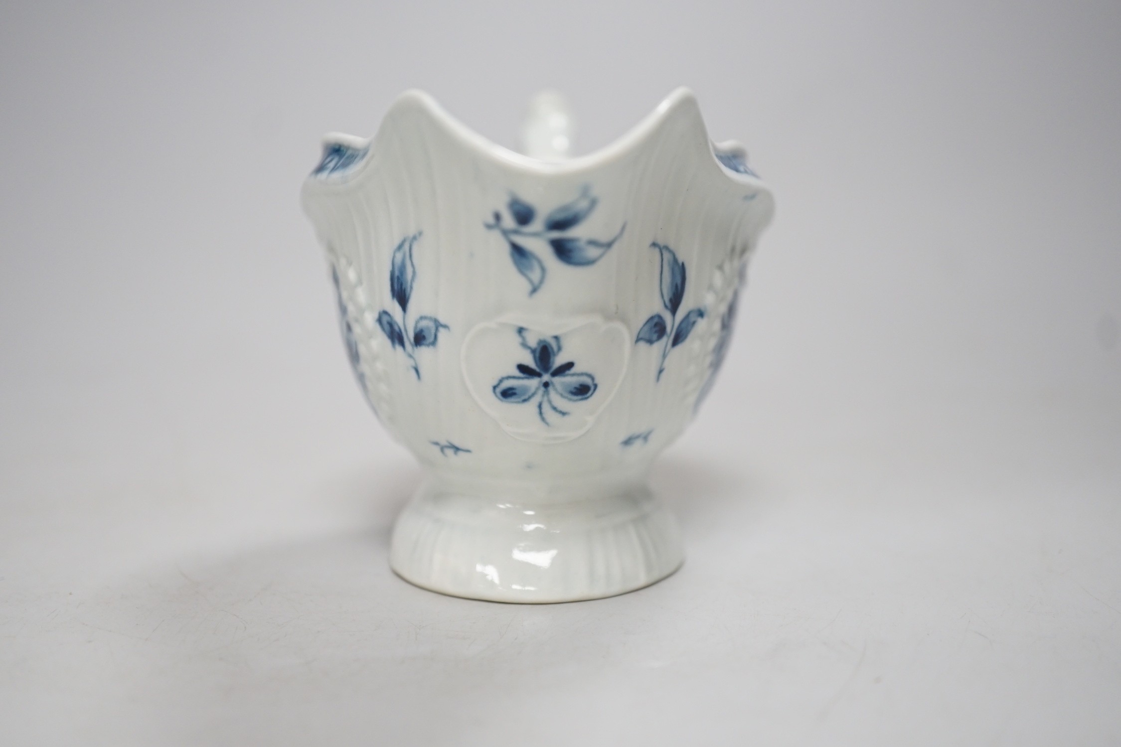 An 18th century Worcester sauceboat painted with the Strap Fluted Floral pattern. 15cm wide - Image 2 of 5