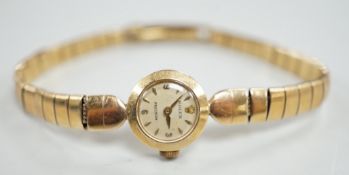 A lady's 9ct gold Rolex Precision manual wind wrist watch, on 9ct gold Rolex bracelet, case diameter
