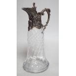 A Victorian rococo style electroplate mounted glass claret jug. 33cm tall