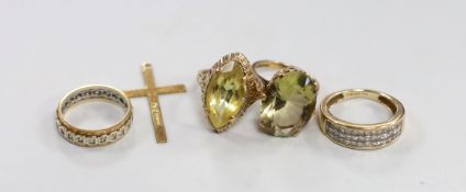 Three 9ct gold and gem set rings, gross 13.4 grams, a 9ct gold cross and one other yellow metal