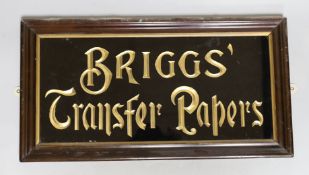 A gilt ‘Briggs Transfer Papers’ advertising panel, 23x42cm including frame