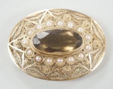 A 14k, oval cut citrine and split pearl cluster set oval brooch, 43mm, gross weight 17.8 grams.