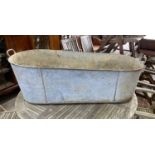 A large galvanised two handled trough, length 127cm, height 39cm