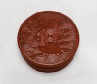 A 19th century Chinese cinnabar lacquer box and cover, 13cm diameter