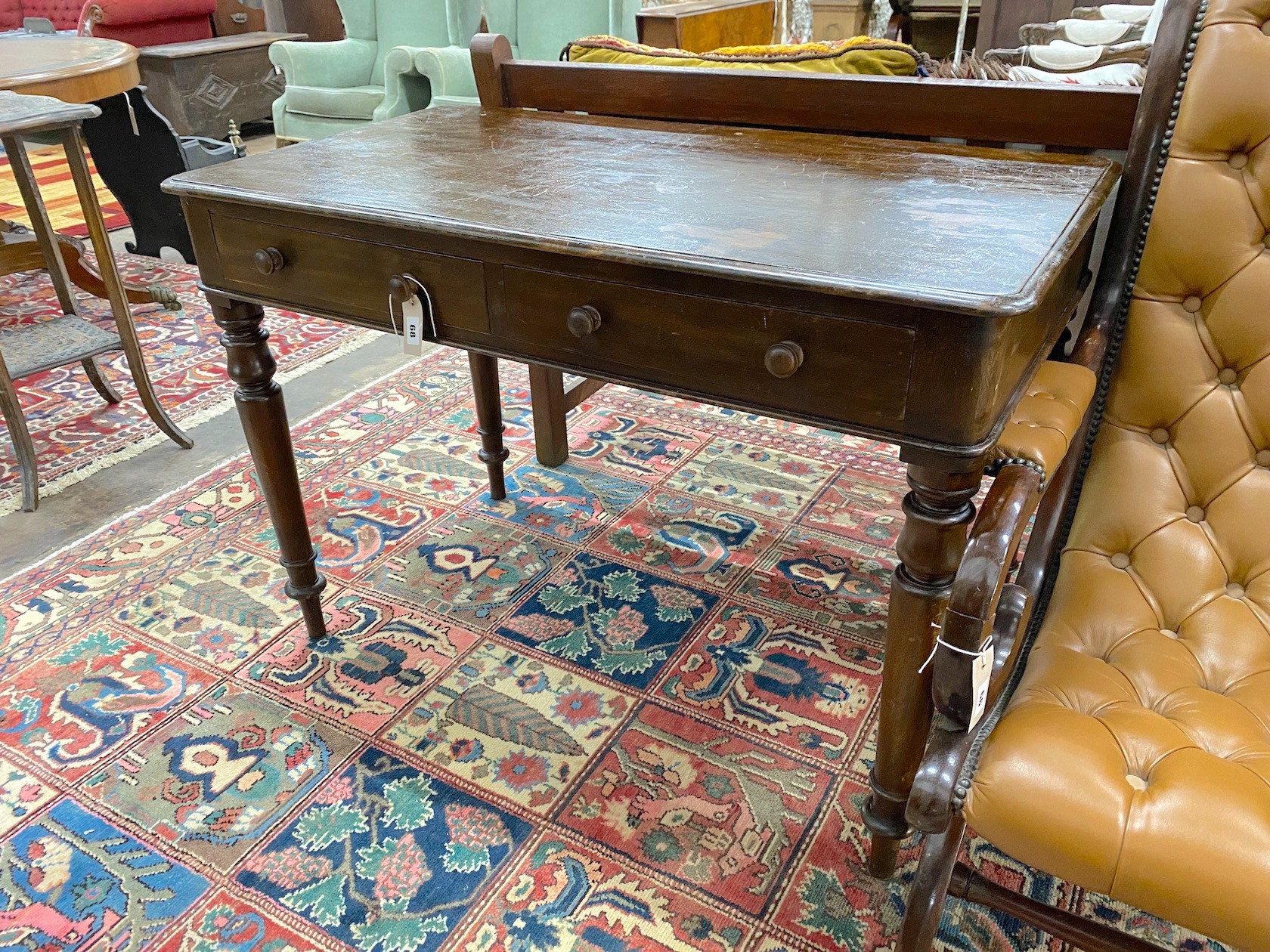 A Victorian mahogany two drawer side table, width 106cm, depth 58cm, height 74cm