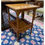 An Edwardian square satinwood two tier occasional table, width 48cm, height 68cm