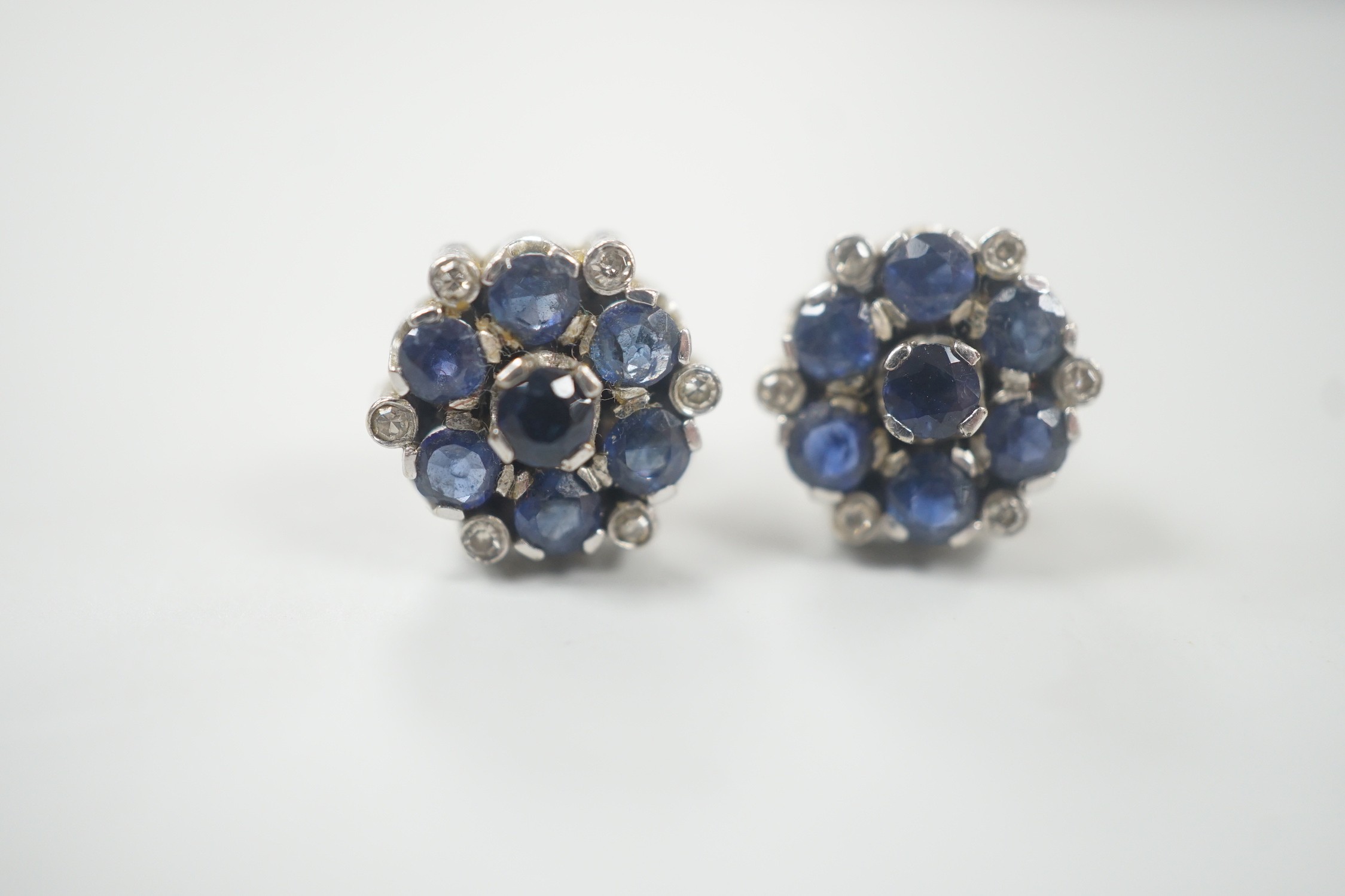 A pair of white metal, sapphire and diamond cluster set flower head ear studs, 10mm, gross weight - Image 3 of 6