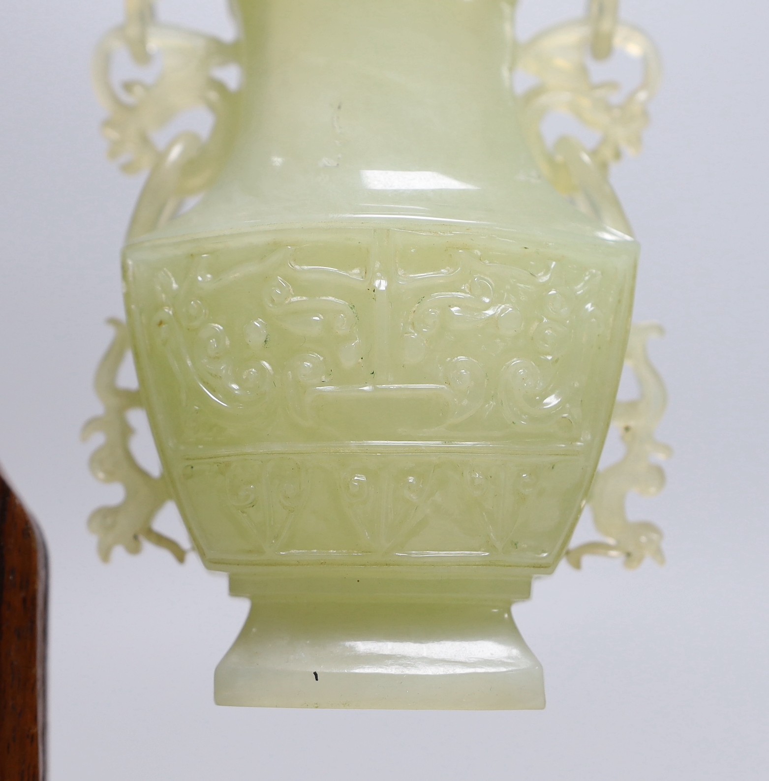 A Chinese bowenite jade hanging vase and cover together with a carved hard wood stand, one foot - Image 2 of 5