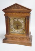 A late 19th century German oak mantel clock, 40.5cm