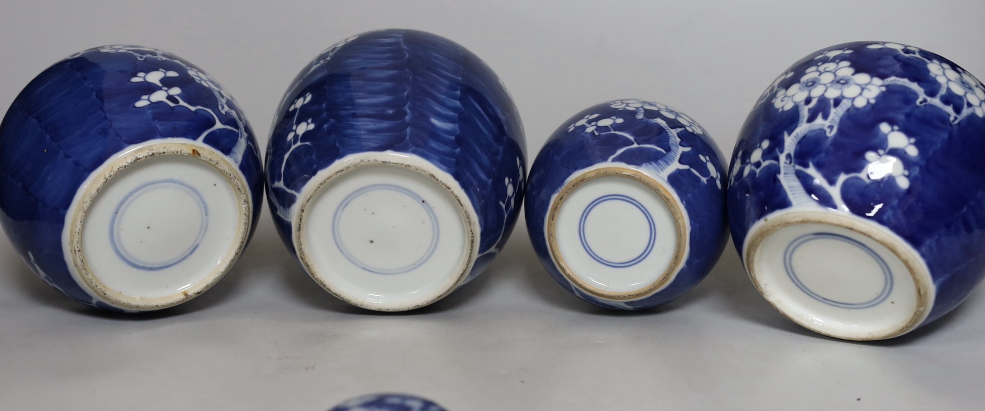 Four Chinese blue and white prunus pattern ginger jars, together with three similar vases. 19th/ - Image 10 of 10