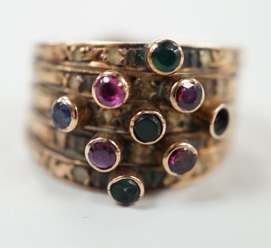 A yellow metal, quintuple band and multi gem set ring (stone missing), size H, gross weight 4.5