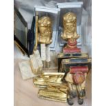 Various pairs of bookends and three photograph frames