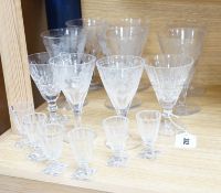 A quantity of engraved and other wine and sherry glasses. Tallest 17cm