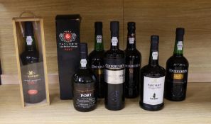 A cased 1996 bottle of vintage Cockburn’s port, together with seven other bottles of various port