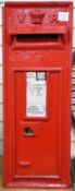 A Victorian red painted cast iron wall mounted post box, 72cm tall
