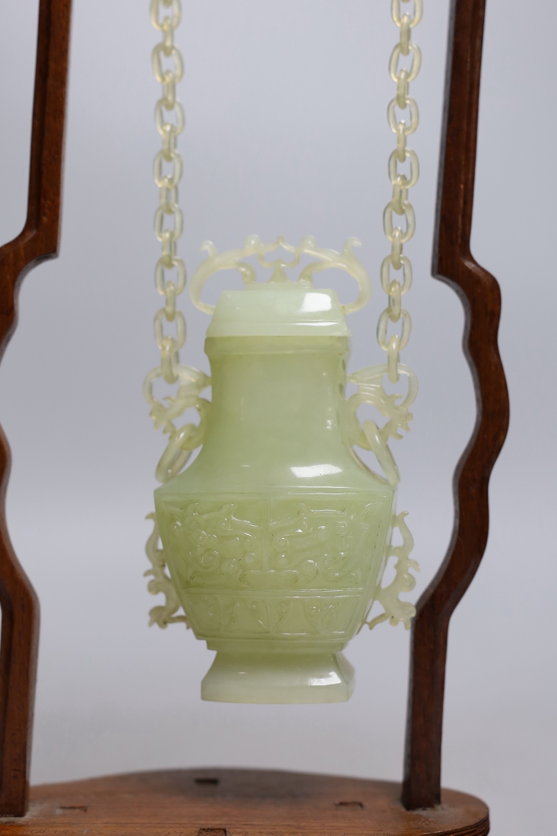 A Chinese bowenite jade hanging vase and cover together with a carved hard wood stand, one foot - Image 4 of 5