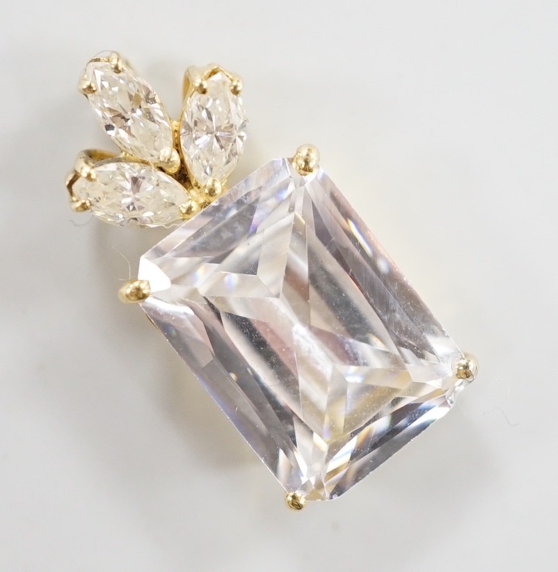 A modern yellow metal mount single stone simulated diamond and three stone diamond set pendant,