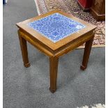 A Chinese hardwood and underglaze blue porcelain tile inset table, width 42cm, depth 42cm, height