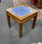 A Chinese hardwood and underglaze blue porcelain tile inset table, width 42cm, depth 42cm, height