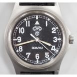 A steel? military CWC pilot's quartz wrist watch, with black Arabic dial, the case back with broad