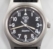 A steel? military CWC pilot's quartz wrist watch, with black Arabic dial, the case back with broad