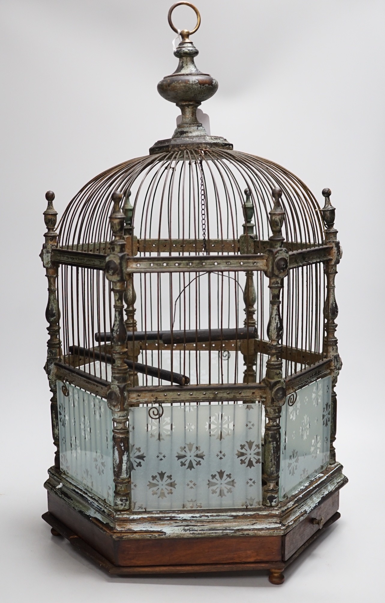 A Victorian brass and glass bird cage. 59cm tall