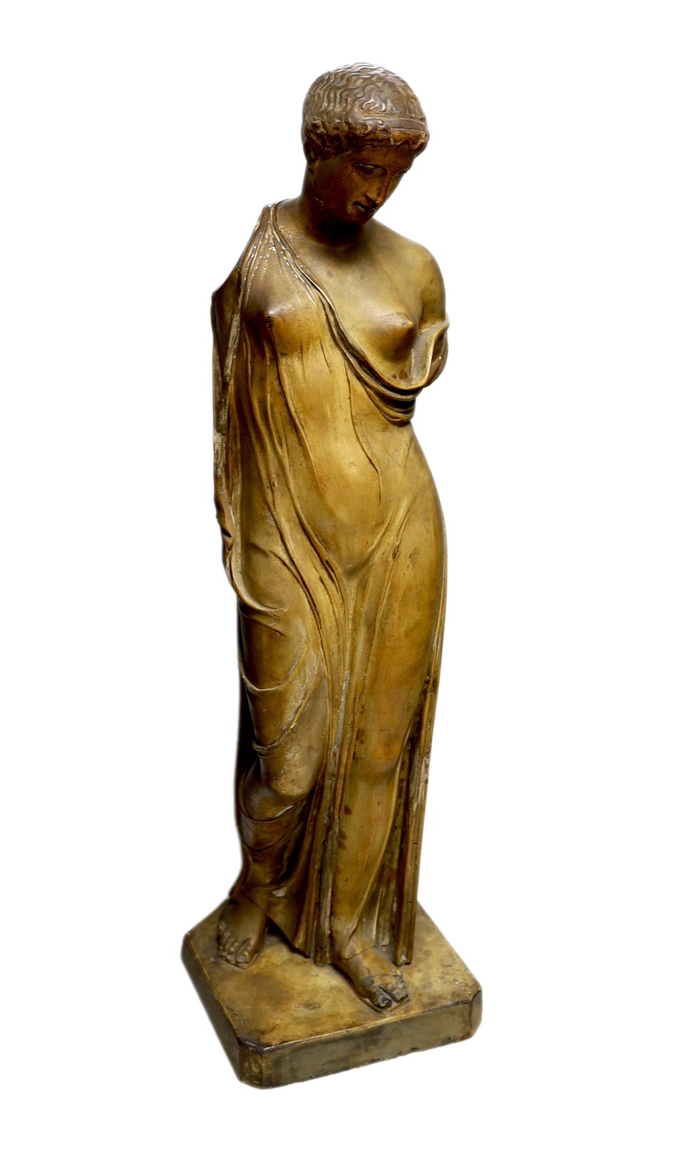 A plaster female figure, after the antique, inscribed ‘2581 D Brucciani & Co, London’ 70cm tall