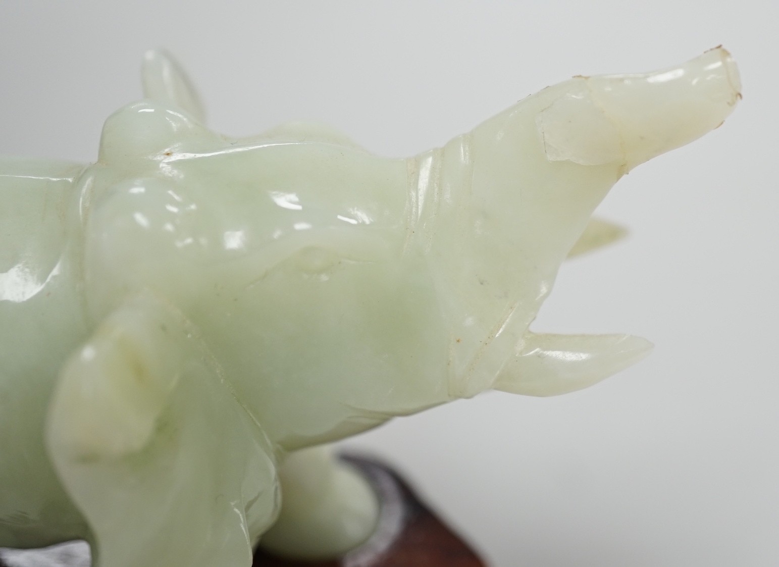 A Chinese bowenite jade elephant on hard wood stand, 11cm tall - Image 2 of 8