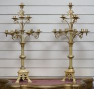 A pair of French neo-gothic ormolu two tier ten light candelabra. 83cm tall