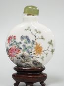 A Chinese famille rose snuff bottle, decorated with birds and rockwork, three character mark, 5cm