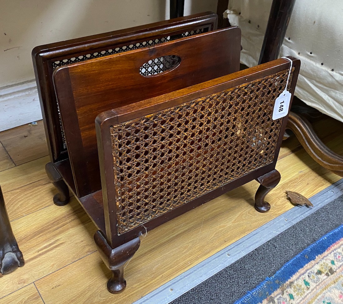 A 1920's caned mahogany two division paper stand, width 40cm, depth 28cm, height 35cm