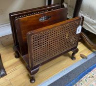 A 1920's caned mahogany two division paper stand, width 40cm, depth 28cm, height 35cm