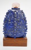 A Chinese archaistic lapis lazuli snuff bottle, 20th century, 5.2cm Provenance - the former owner