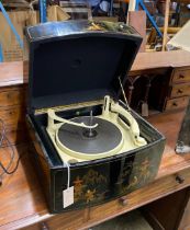 A 1960's chinoiserie lacquer Pye record player, width 43cm