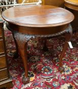 An early 20th century Chippendale revival circular mahogany centre table, diameter 73cm, height