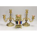 A pair of two branch three light gilt bronze candelabra and a brass cotton reel holder, candelabra