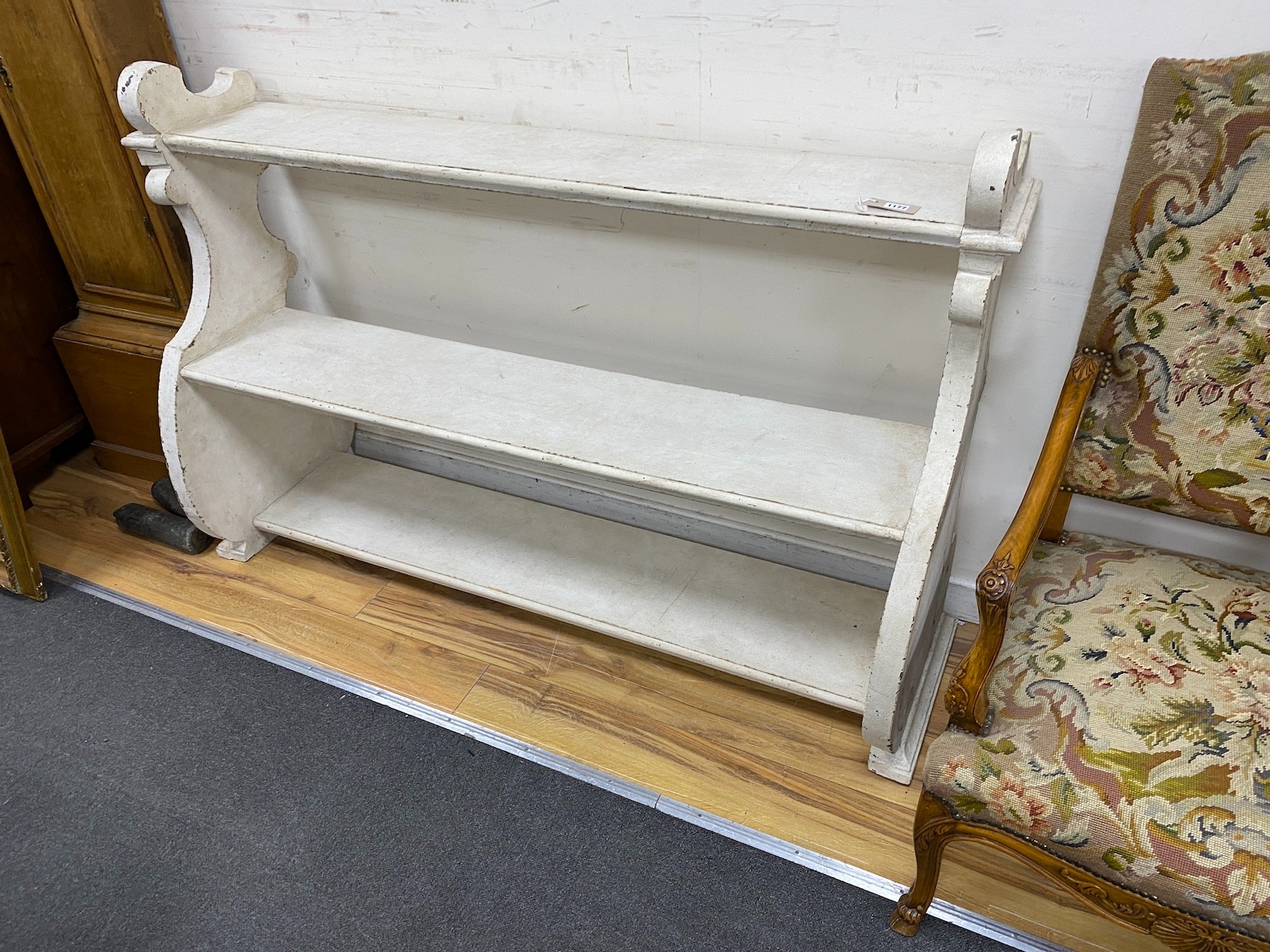 A pair of Victorian painted open bookcases, length 156cm, depth 46cm, height 102cm