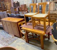 An early 20th century oak and zebra wood dining suite by Ebenezer Gomme, comprising draw leaf table,