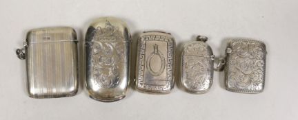 Three assorted early 20th century silver vesta cases, largest 56mm and two plated cases.